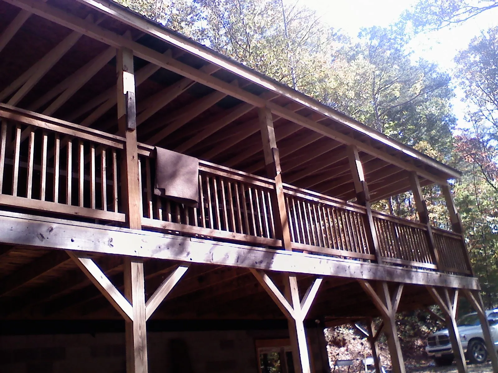 Timber framing under a new elevated porch and deck — Roof Leak Repair in Quenemo by Roofing Brothers